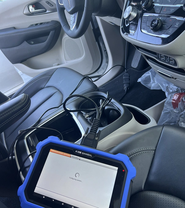 everest tablet rests on the dashboard of a car